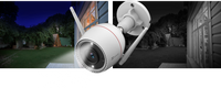 HortonBe EZVIZ H3C COLOR 4MP 2K+ outdoor smart Wi-Fi security camera mounted outdoors with lens and weatherproof casing.