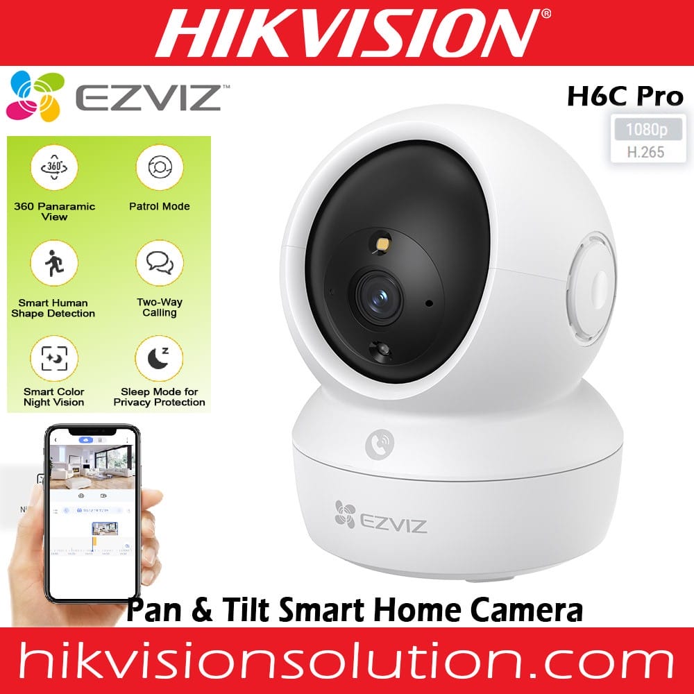 HortonBe EZVIZ H6c Pro 2K+ pan and tilt smart home camera with night vision, shown in a dark room setting.